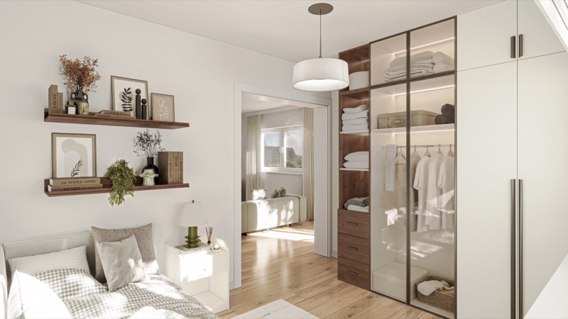 Schlafzimmer mit Einbauschrank und Durchgang zum Wohnraum